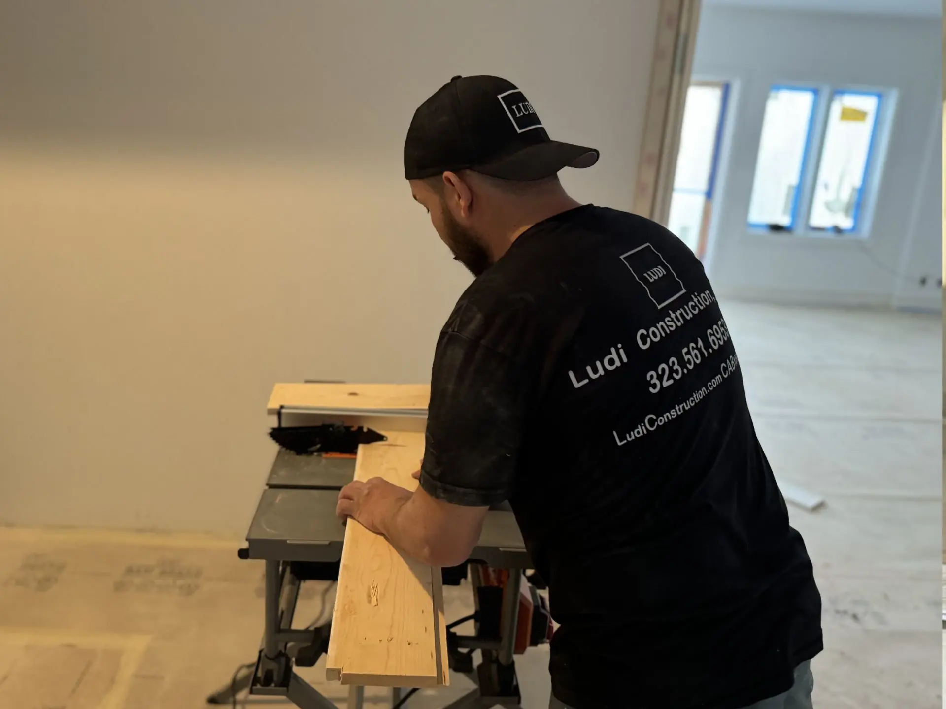 Ludi Construction team member working on a residential construction site